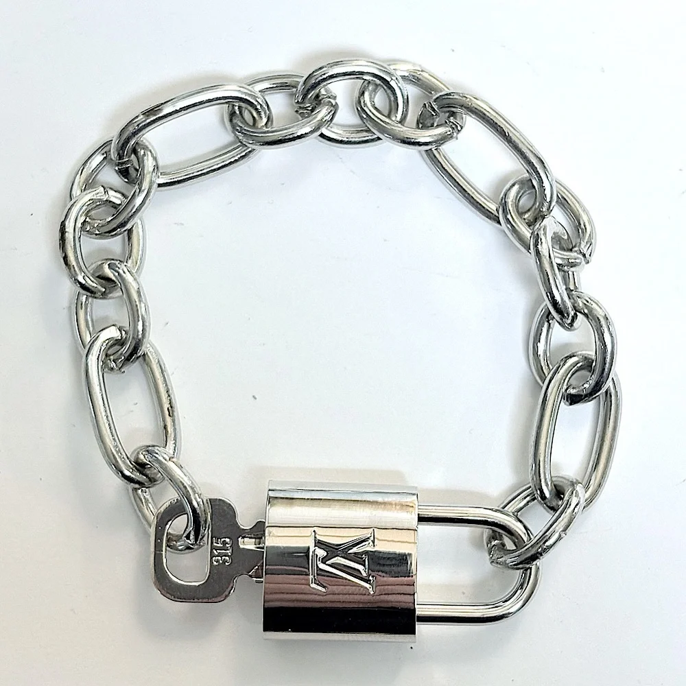 Silver Authentic Louis Vuitton Padlock and Key, Bracelet comes complementary - Picture 1 of 9